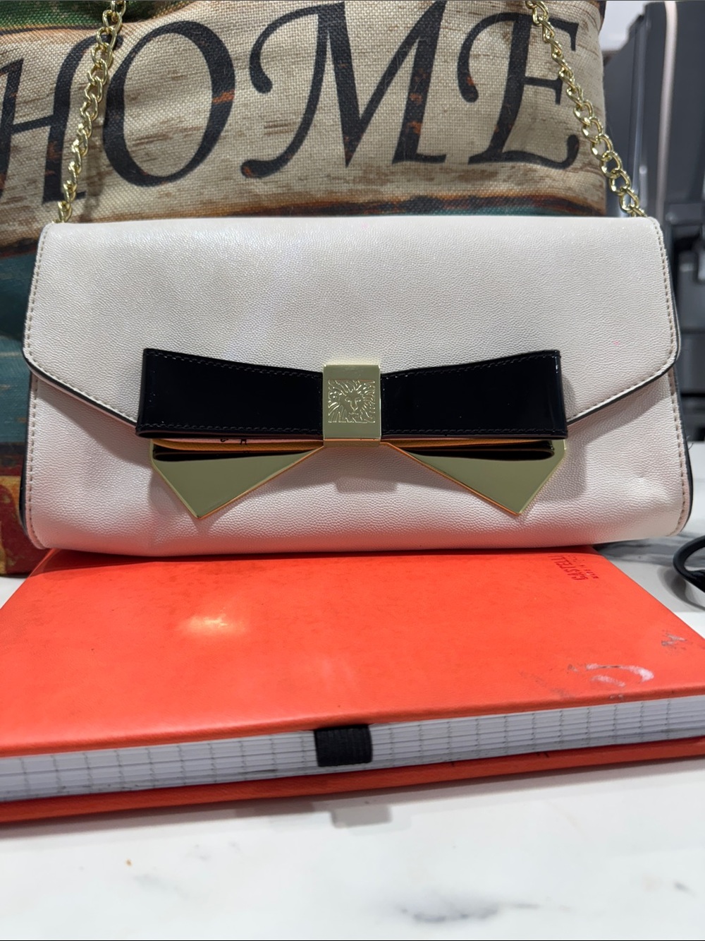 Anne Klein Cream Shoulder Bag with Black Bow and Gold Hardware